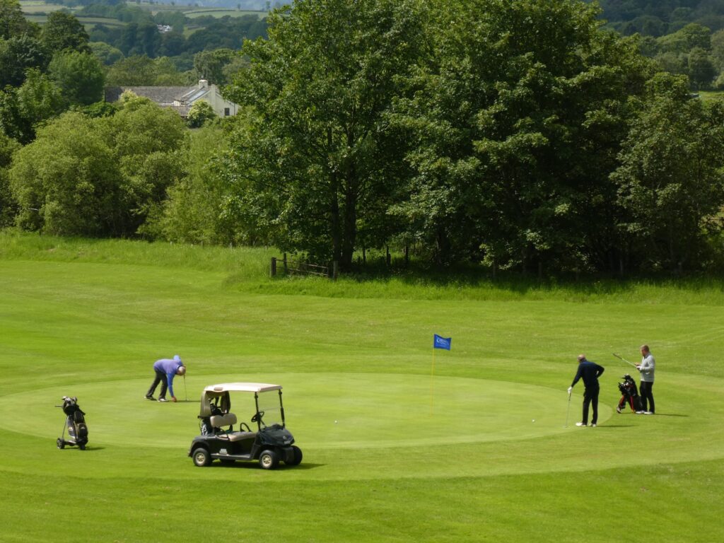 A golf group On the golf green